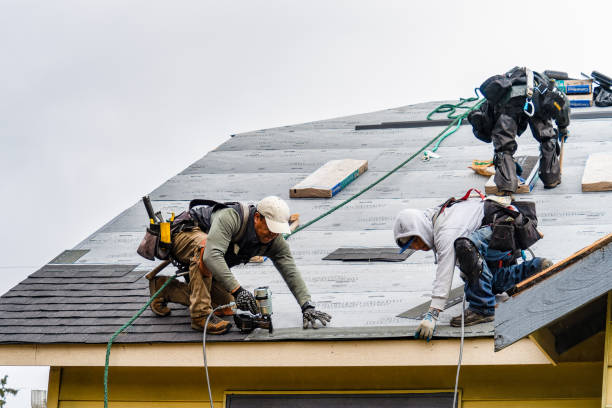 Professional Gutter Installation technician working in Snook, TX